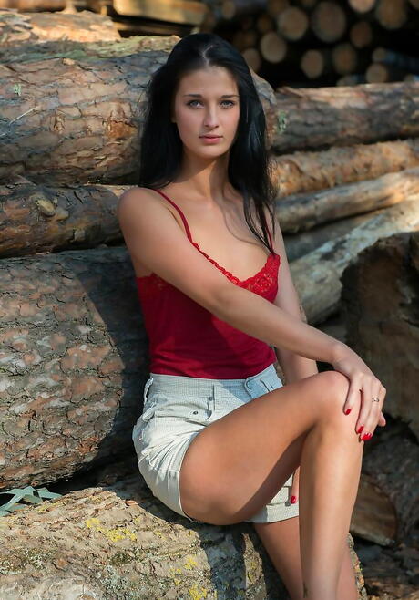 Excellent brunette young Katya Ac exposes small tits and hairy beaver outdoor